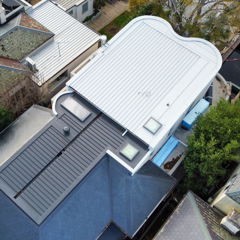 Roof and roof plumbing by Scotland Marshall Plumbing on a Middle Park home, aerial view